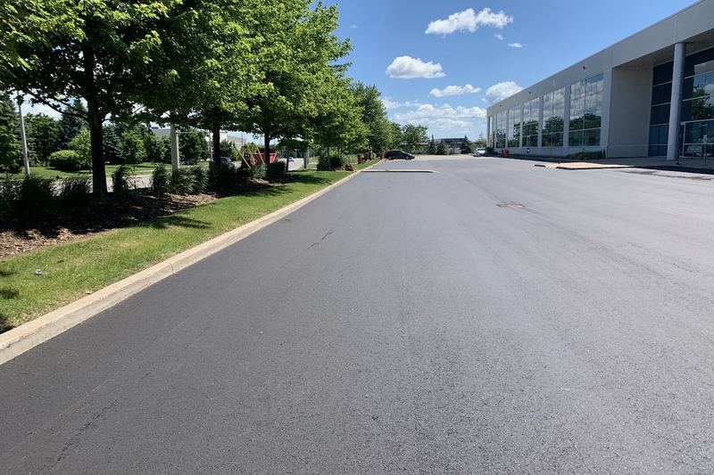 Our team's work: new surface course on an industrial road